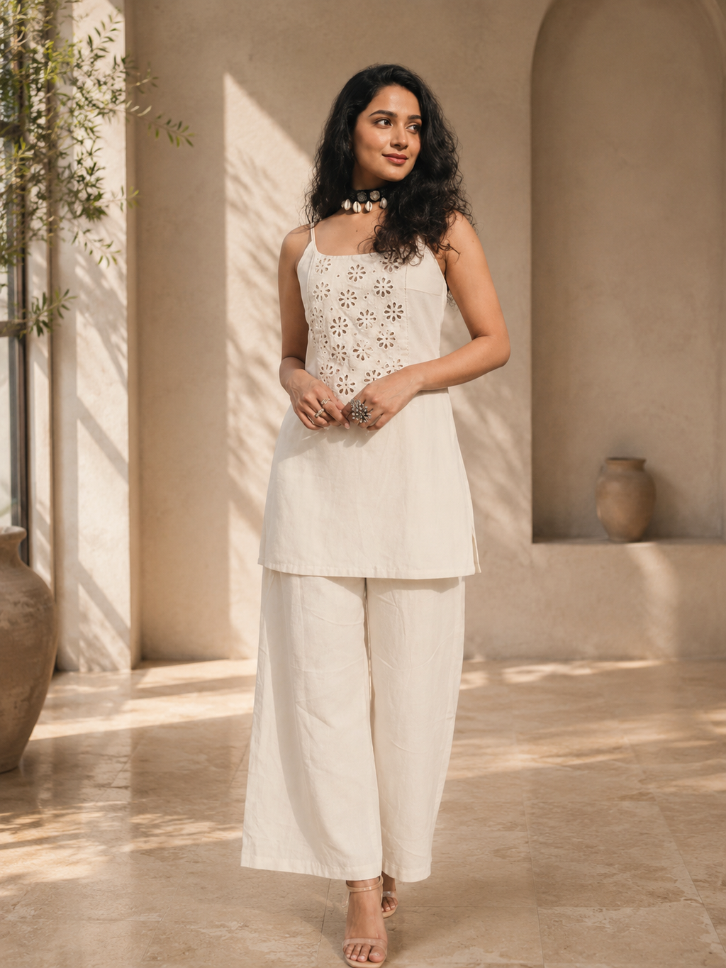 Chaand :- An Ivory Eyelet Embroidered Kurta Palazzo Set